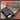 400-lumen high-output EDC rechargeable flashlight with features listed on a textured surface.