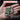 Mini pocket light held in a hand with text describing its features.