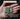 Mini pocket light held in a hand with text describing its features.