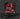 Set of red tools in a black storage case on a dark background