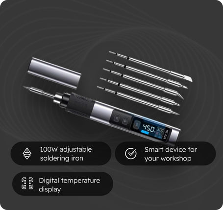 A digital soldering iron shown with its cap removed and several interchangeable metal tips arranged beside it on a dark gray background. Text callouts mention 100W adjustable soldering iron, smart device for workshop, and digital temperature display.