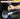Hand using a tool with text about hardened steel construction