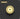 A circular saw blade with a gold glitter outer section and a pale cream center, shown on a dark gray background with concentric wave lines. A gold label in the top-left corner reads 'SAW BLADE 1 PC'.