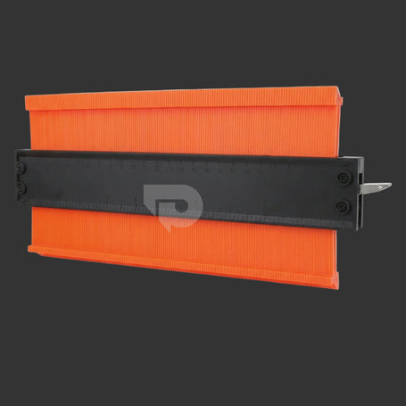 Alloy contour gauge profile tool on the dark grey background