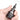 Multifunction screwdriver with diamond pattern and non-slip rhombus design held in a hand.