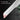 Knife blade with 60-degree angle marking on a dark background