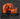 Orange diamond grinding tool with features highlighted on a dark background