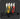 Four folding multifunction utility knives with different colored handles on a dark background.