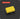 A bright yellow rectangular sponge block shown on a dark gray background with subtle concentric circular lines. A red label at the top reads 'SQUARE 2.