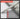 Pen with vernier caliper feature on a concrete surface, labeled with characteristics.