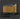 Set of yellow metal tools with hexagonal bodies on a dark background
