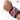 Red magnetic wristband with a strong magnetic field, securely holding wrenches, screws, and drill bits.
