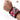 Red magnetic wristband with a strong magnetic field, securely holding wrenches, screws, and drill bits.