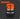Orange safety vest with reflective stripes on a dark background