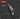 Knife with labeled features on a dark background